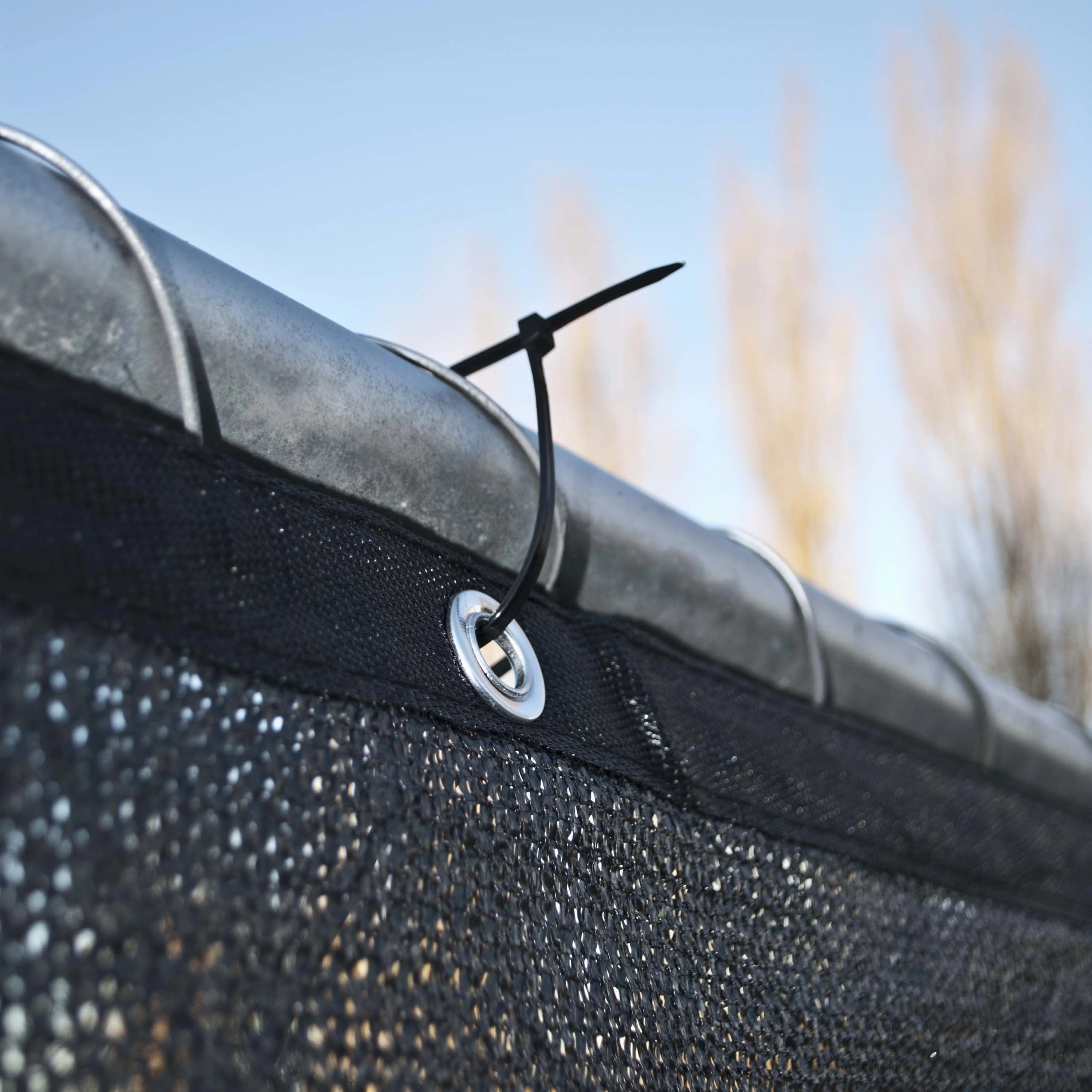 ALEKO 6'x25' Black Fence Privacy Screen Mesh Fabric With Grommets